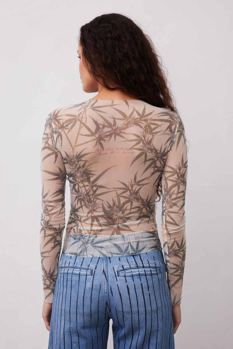 Grover Rad Chronic Mesh long sleeve top with cannabis leaves on cream background