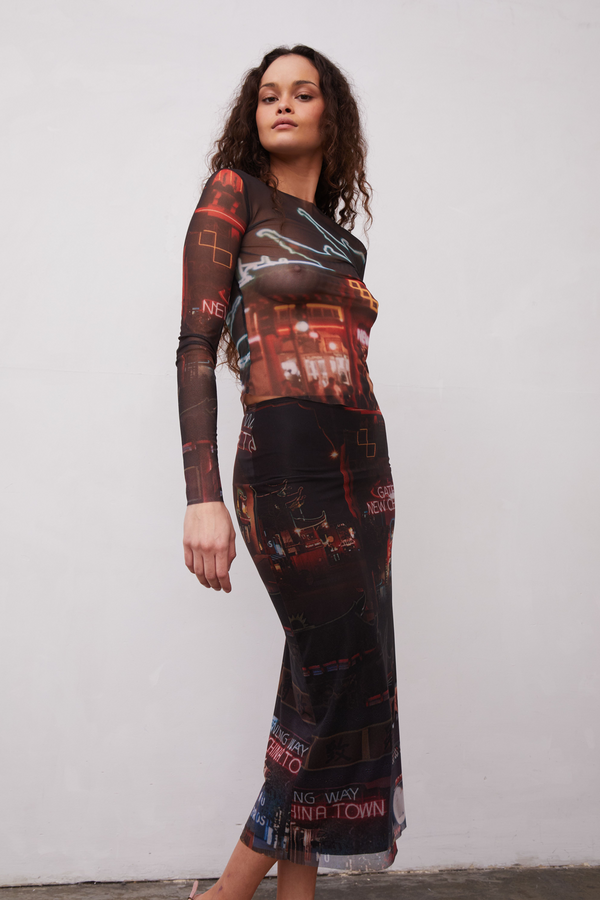 Grover Rad Gateway Mesh long sleeve top and midi length skirt featuring a chinatown print with black background