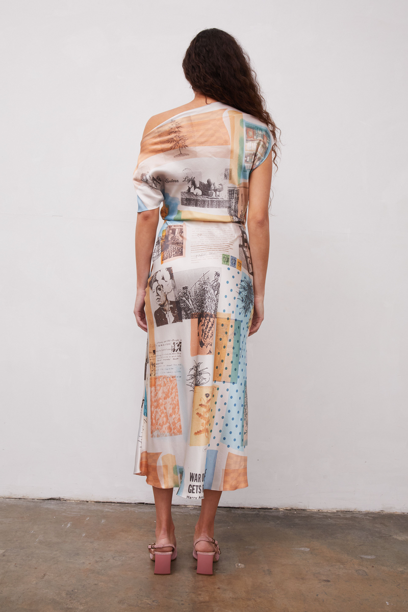 Grover Rad Hendrix Silk Bias dress midi length featuring orange and blue collage off the shoulder fit