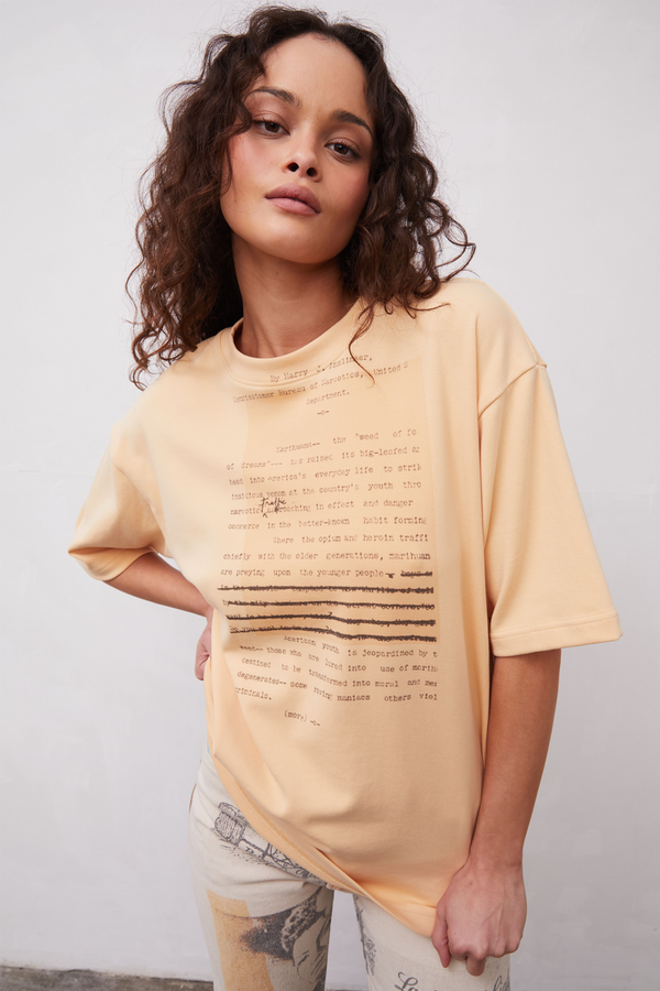 Grover Rad the Narc Oversized T-Shirt Orange sherbet color with anslinger text printed